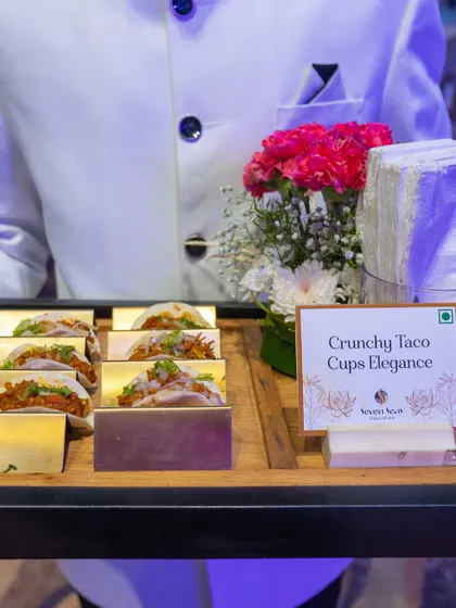 Our Crunchy Taco Cups are a testament to elegance and flavour. These bite-sized canapés are a favourite at corporate mixers and galas, designed to be as visually appealing as they are delicious, and served with seamless hospitality.