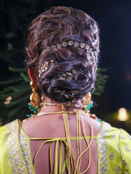 An elegant updo is all about texture and placement. Learn the techniques for creating soft, romantic updos and how to weave in delicate hair accessories for that extra touch of sparkle.