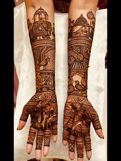 A beautiful blend of fauna and architecture in this traditional design. It features peacocks, elephants, and palace-inspired motifs, telling a story of royalty and grace.