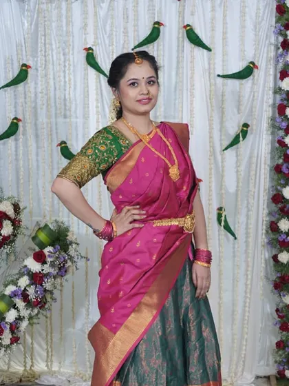 The final look for the baby naming ceremony. She looks absolutely radiant in her half-saree with makeup that is both traditional and fresh.