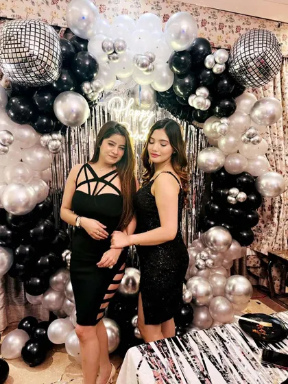 Our clients enjoying their stunning disco-themed birthday backdrop. It’s the perfect setting for capturing fun memories with friends.
