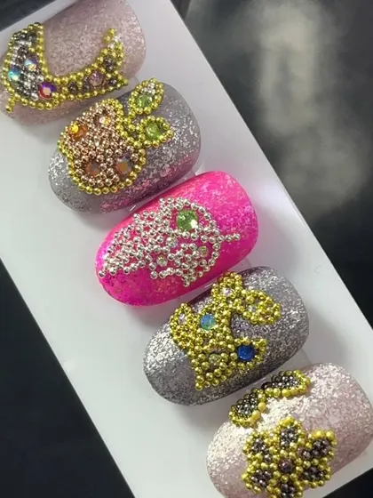 Another angle of the crystal bead designs, showing the texture and sparkle of this unique technique.