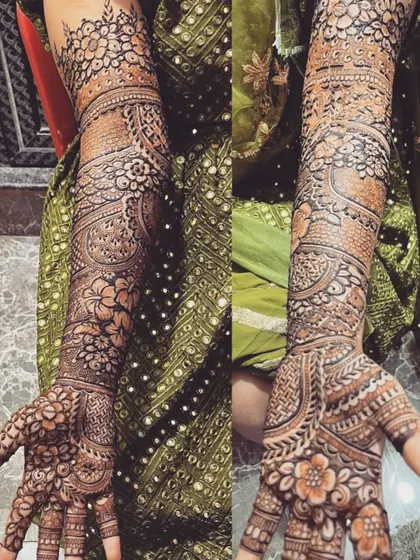 This full-arm bridal design showcases a blend of floral and traditional Indian patterns. The intricate details and clean lines are a testament to the years of experience I bring to every appointment.