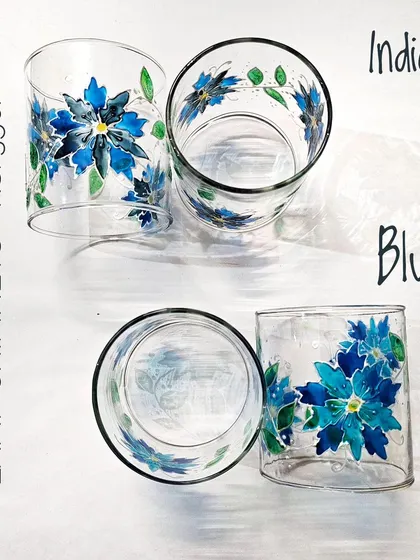 A closer look at the floral lamp chimneys in 'Indigo' and 'Blue'. The glass paints give them a lovely translucent quality.