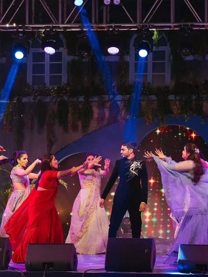 A surprise performance for the groom by the bride's squad, complete with stage pyrotechnics for that extra wow factor.