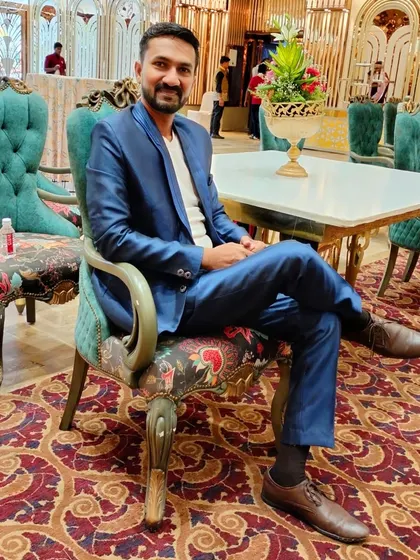 Taking a moment to relax at the beautifully decorated venue in Amravati before the 95th birthday show began.