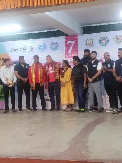 Our coach stands with other officials and participants at the WAKO International Kickboxing Training Camp. This involvement at the organizational level of the sport showcases our deep commitment to the growth of kickboxing in India.