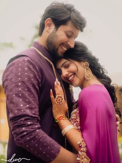 A warm and loving embrace, this portrait showcases the couple's easy chemistry and happiness during their pre-wedding celebrations.