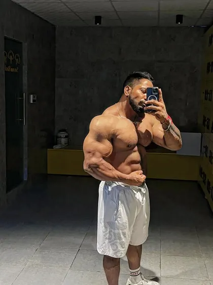 An alpha mentality pose, showing confidence and strength.