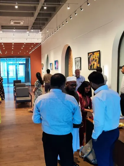 The bustling atmosphere at the 'Surreal Strokes' opening day.