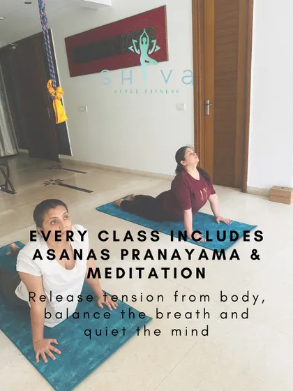 A holistic practice for complete well being. In every class, we combine physical postures (asanas) like the Bhujangasana or Cobra Pose seen here, with breathing exercises (pranayama) and meditation. This approach helps release physical tension, balance your energy, and quiet the mind.