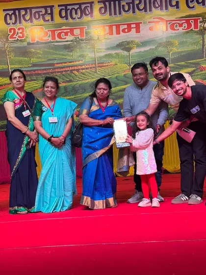 We were honored to judge a dance competition at the Lions Club Ghaziabad Ekta's Shilp Gram Mela. Here's our instructor presenting an award to a talented young winner.