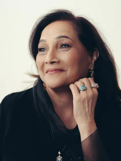 Our muse Bhavana wears the Décoratifs Stack Pendant, reimagined with a sleek black wire for a contemporary silhouette. It's a striking mix of semi-precious gemstones set against an art deco motif.