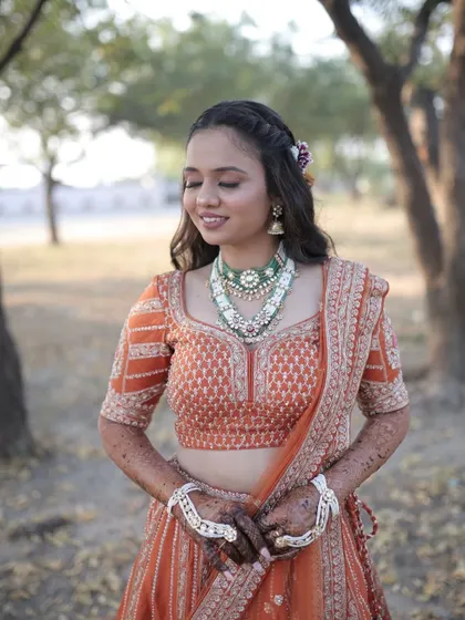 A serene moment, with her eyes closed, showing the soft and blended eyeshadow. This look is all about subtle beauty.