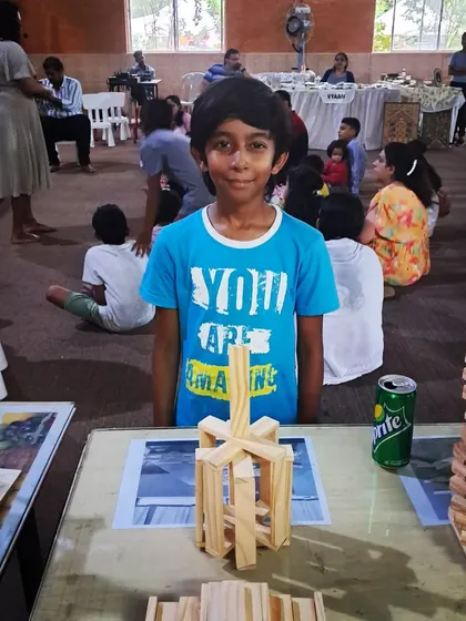 This young man was completely focused, using his natural intelligence to create multiple structures from his own imagination. It's thrilling for me to see a child take the basic tools and create something entirely new, without any instructions.