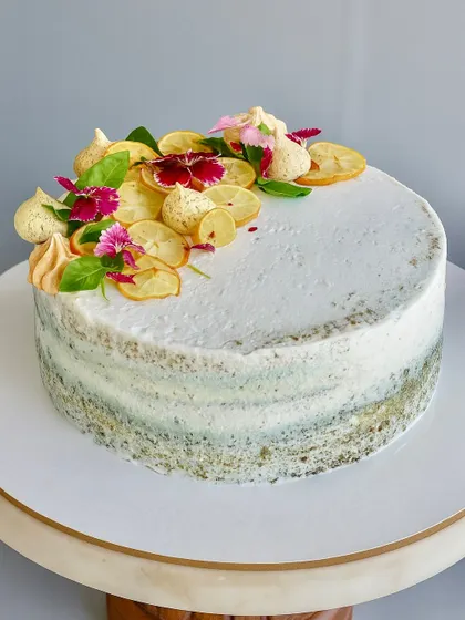 For the adventurous palate, my Lemon Basil Naked Cake is a unique treat. A light lemon and basil-infused sponge is layered with a zesty lemon curd and cream, then topped with candied lemons and fresh basil. It’s an unexpectedly refreshing and aromatic dessert.