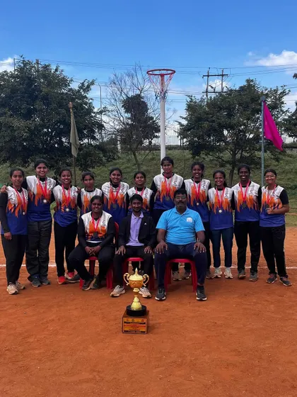 The complete girls' team and coaches after securing 3rd place in the 6th Junior State Level Netball Championship.