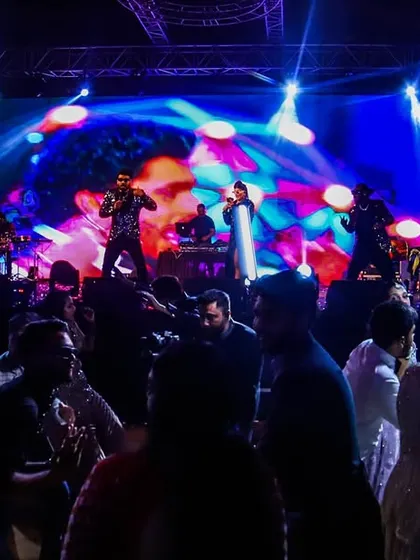 A view from the stage of what we love to see: a dance floor filled with people having the time of their lives. This is the goal for every corporate annual party we perform at.