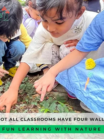 A moment of intense focus as children discover a touch-me-not plant on our nature walk. These small discoveries spark big curiosity and lead to wonderful conversations about biology and the environment.