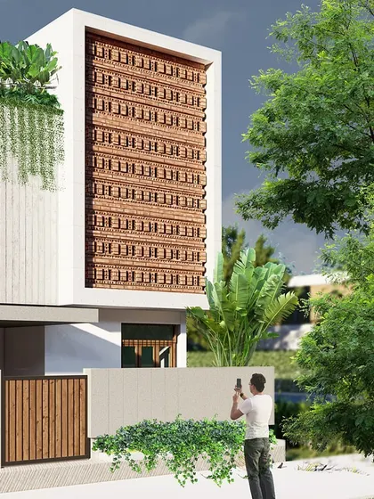 A variation of the brick screen facade, this view highlights the contrast between the earthy red brick and the lush green foliage. The design feels modern, yet grounded in natural materials.
