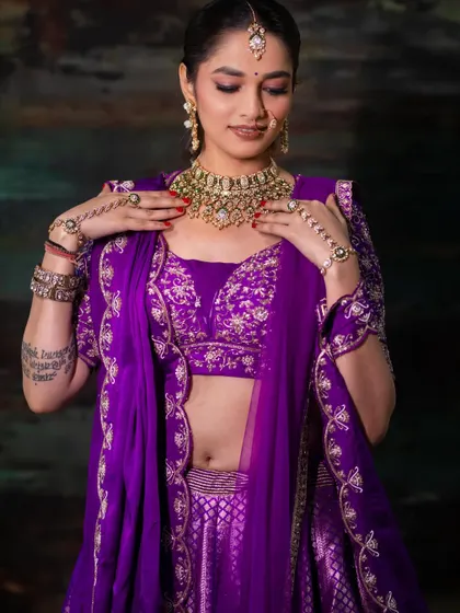 A bridal look created for a makeup expo, featuring a vibrant purple lehenga. This look is all about bold colour and modern bridal style.