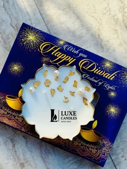A classic Diwali Urli candle, adorned with gold foil and pearls, and packaged in a festive "Happy Diwali" box. I offer these in various sizes to suit your needs.