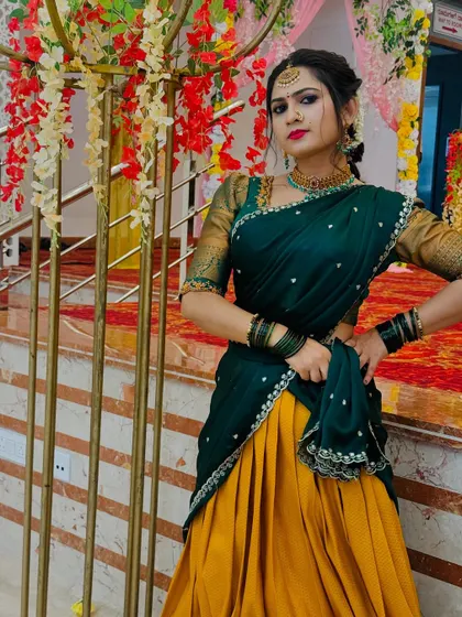 A confident pose in a traditional Langa Davani, perfect for making a statement at any family function.