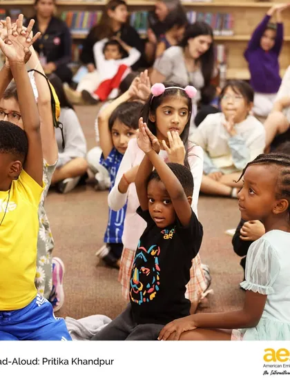 Students and parents participate in movements that go along with the story. Our library events are designed for the whole family, strengthening the home-school connection.