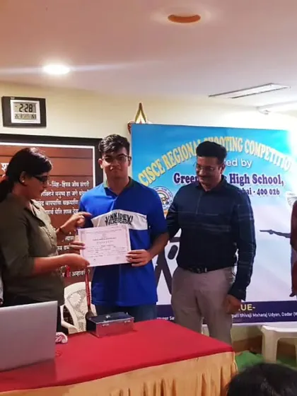 Aayan Goghabori receiving his certificate for winning a silver medal in the 10m Air Pistol Men's category at the CISCE Regional Shooting Championship.