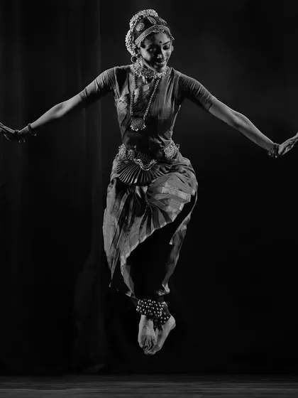 The feeling of weightlessness in dance, a moment of pure nritta. This mid-air pose from 'Shringara Sharanagati' captures the energy and technical precision of the choreography.