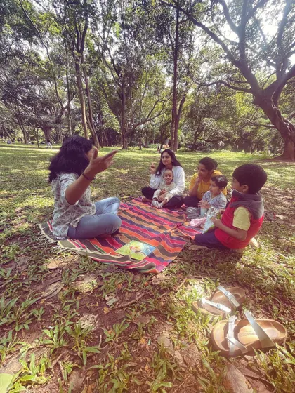 A series of photos from our 'Storyscapes 16' session, capturing the authentic, unposed moments of our circle. You can see children listening, playing, and interacting naturally, which is the essence of our child-led storytelling approach.