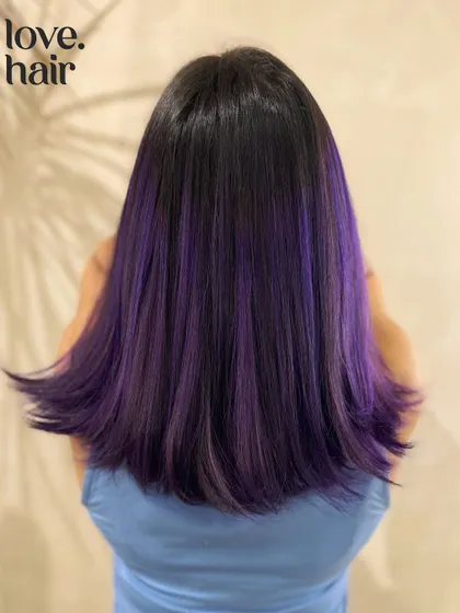 Our 'rang barse' look on straight hair, showing how the purple highlights create sleek, graphic stripes of colour.