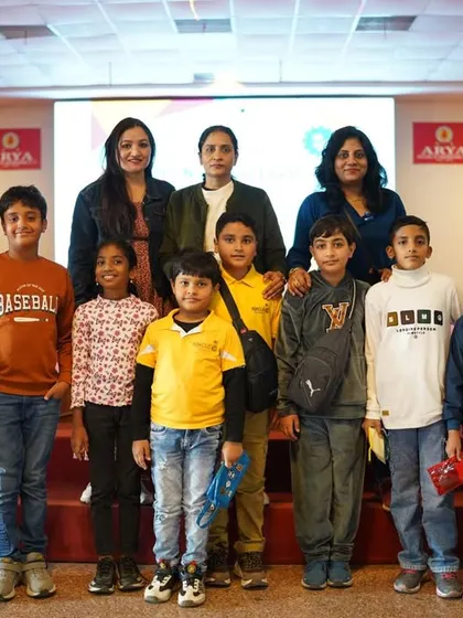 A group of students posing with their teachers and our founder after the event.