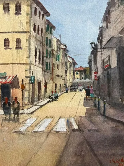 A cityscape of Pisa, Italy, which was displayed at the IWS watercolor festival in Noida. This piece captures a quiet street scene with a focus on perspective and light.