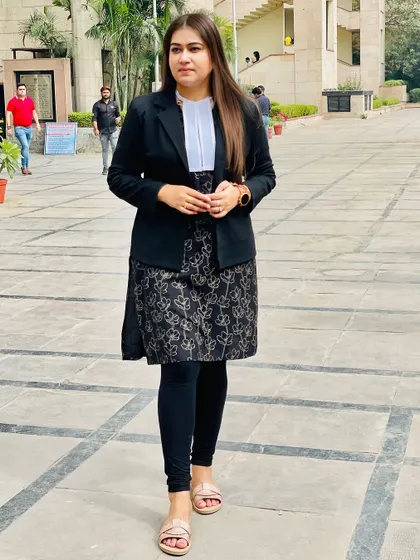 Standing outside the court, ready for action. The eagle emojis represent the sharp focus and vision I bring to every case.