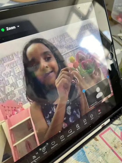 A close-up view from a student's screen during our online clay class. The engagement and creativity are just as high as in our in-person sessions.