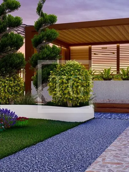 This render highlights the softscape design for the Noida project, with manicured topiary, colorful flower beds, and textured pathways.