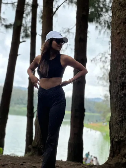 Taking a moment to breathe and connect with the serene lakeside view during a retreat hike. These pauses are just as important as the movement.