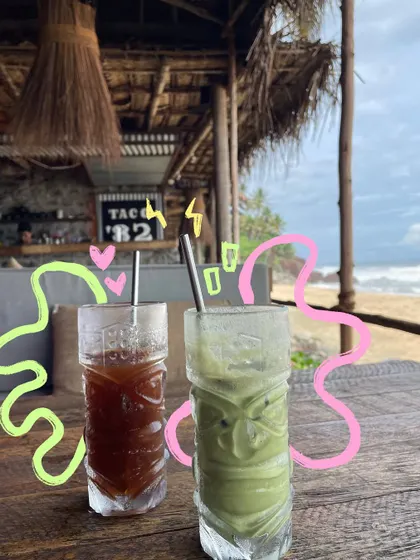 Colorful drinks at a beach shack, with equally colorful doodles to match the fun, tropical vibe.