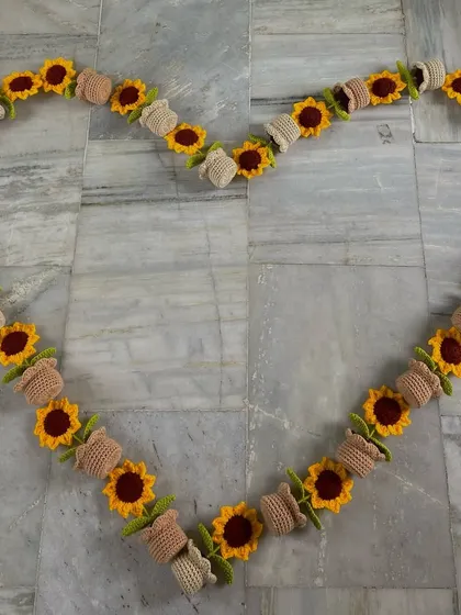 My potted sunflowers arranged in a heart shape, just for fun after finishing a big order.