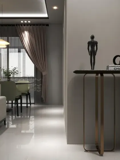 A modern console table at the entrance of the living area provides a stylish spot for decor, setting a sophisticated tone for the rest of the home.