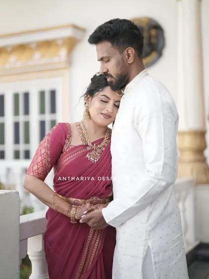 A tender moment between the couple, with Anupa looking serene in her custom Anthariya creation.