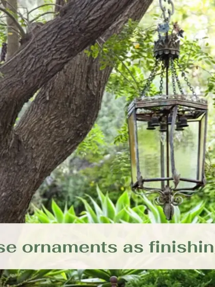 Small details can make a big impact. Using decorative ornaments like this vintage-style lantern as a finishing touch adds character and a point of interest to the garden design.