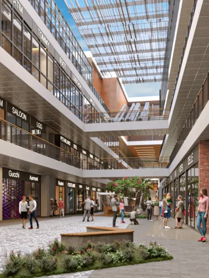 The multi-level atrium at V'lante is designed to be a vibrant social space. The open corridors and visual connections between floors create a dynamic environment that encourages movement and exploration.