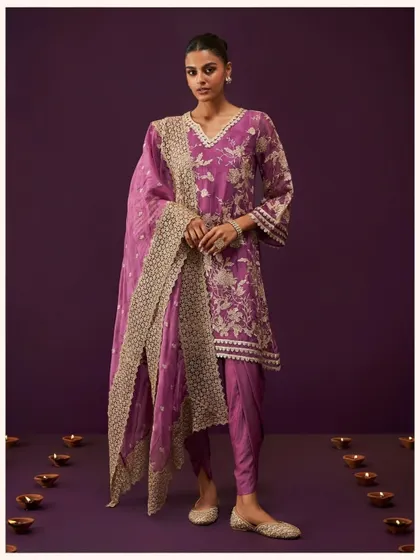 Here is the Sunee Organza Grape Kurta Set again because it's just that good. The detailed embroidery on the organza fabric makes it a truly special piece for your collection.