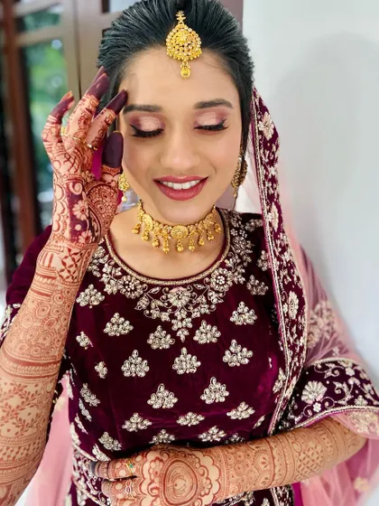 The most rewarding part of my job is seeing a happy bride. Here is the beautiful Shahana, all smiles on her big day, with her henna stain looking rich and dark against her gorgeous velvet lehenga.