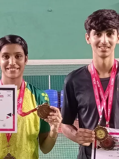 Alina and Lakshay showing their hard-earned medals and merit certificates from the Delhi State Ranking tournament. They were dominant in the Under 15 doubles category.