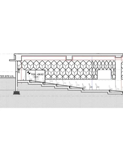 A detailed section drawing of the auditorium wall, showing the precise assembly of acoustic panels, insulation, and support framework. This level of detail is essential to achieving the high-performance standards our cultural venues are known for.