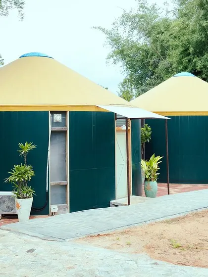 The unique exterior of our yurt-style cottages at Kanakapura, offering a distinctive and private accommodation experience.