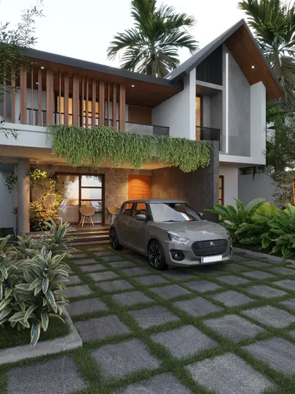 A Trivandrum project featuring a carport covered in hanging vines, vertical wood screens, and integrated LED strip lighting.